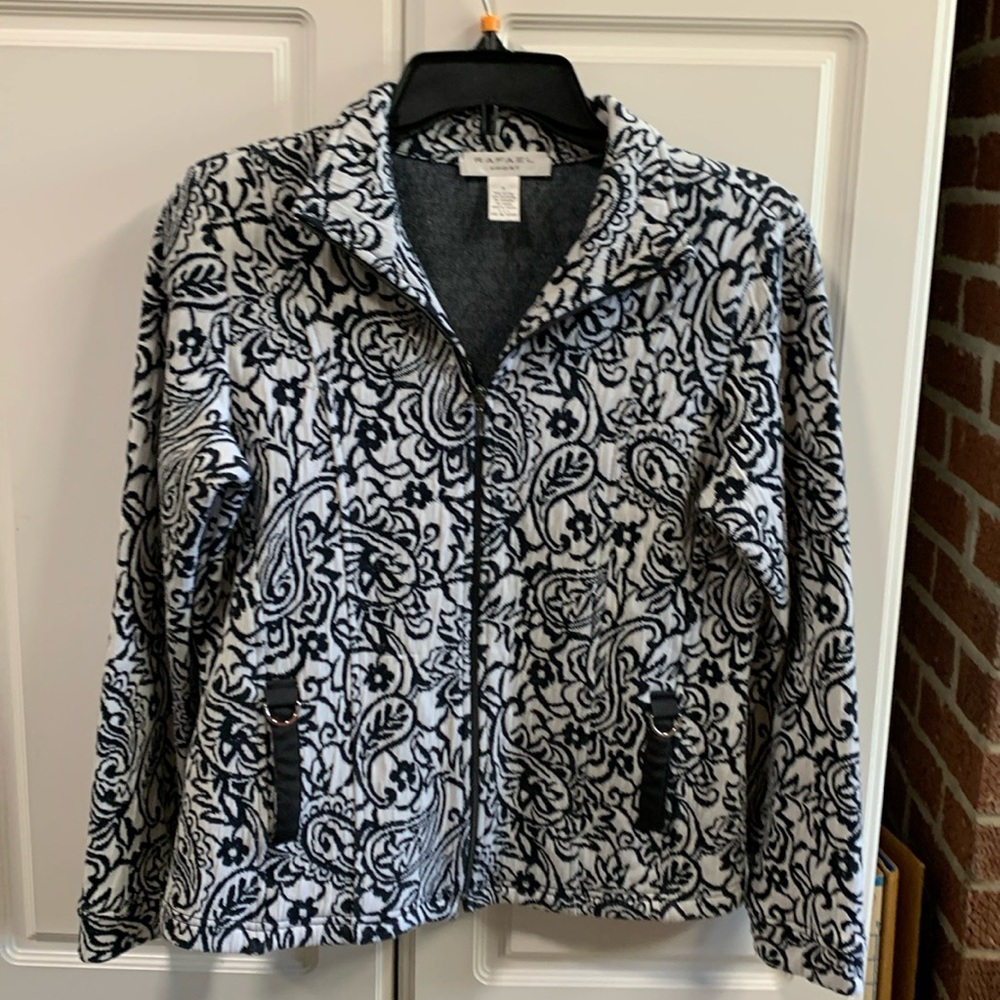Ladies size small black and white jacket by Rafael.